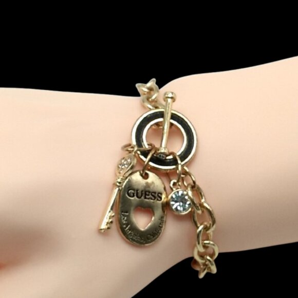 GUESS Toggle Chain Bracelet with Charms Gold-tone *Small Flaw* - Picture 2 of 15